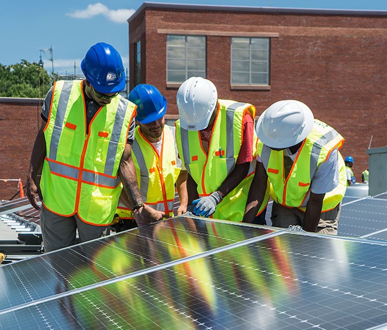 Group of Workers & Solar Panel